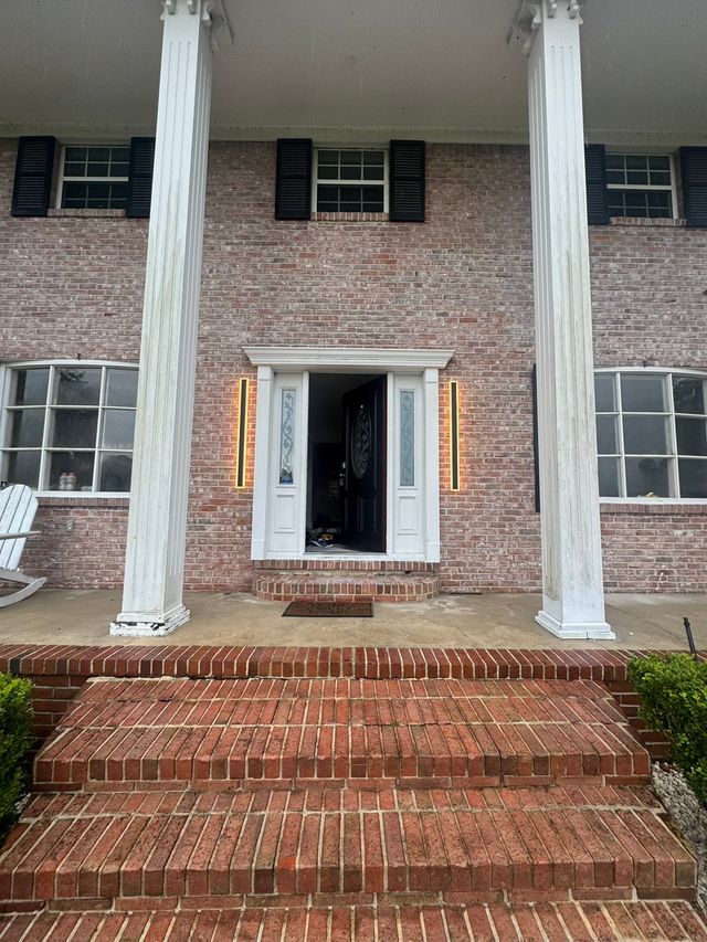 Brick entryway and front door.